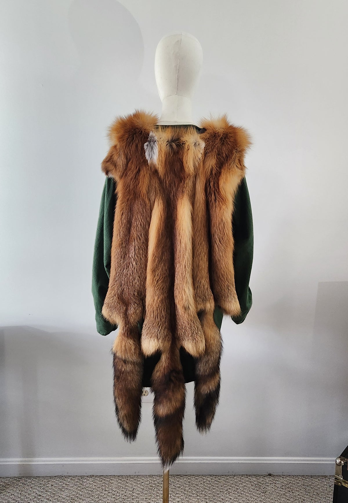 Triple Red Fox Mantle on Brown Leather