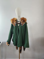 Triple Red Fox Mantle on Brown Leather